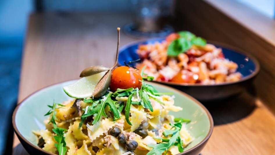 Ein Teller Pasta mit Rucola und Kirschtomate im Ristorante Trenta. | © Ristorante Trenta